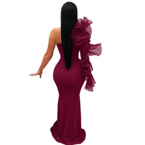 Detail of burgundy one-shoulder mermaid dress with ruffled organza lace sleeve back view