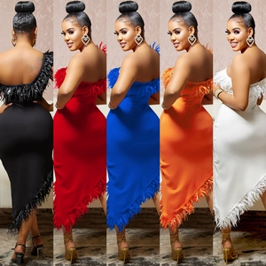 Sleeveless V-neck bodycon dress with feather trim hem in five vibrant color options