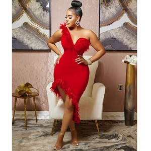 Elegant red one-shoulder bodycon dress with feather trim and asymmetric hemline design