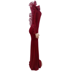 Detailed side view of wine red floor-length dress with elegant organza ruffle sleeves