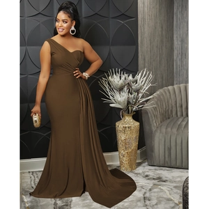 Detail of elegant coffee brown one-shoulder evening dress with pleated waist and fishtail hem