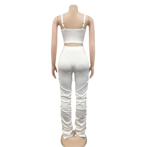 Rear view of white two-piece set featuring crop top and stacked ruched pants for women