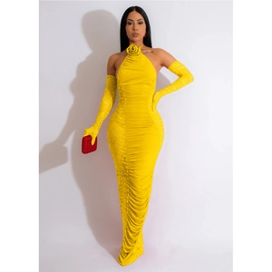 Detail of yellow halter maxi dress with floral neck accent and matching lace gloves