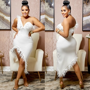Detail of white one-shoulder midi dress featuring elegant ostrich feather trim and slim fit