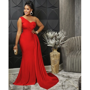 Detailed view of red one-shoulder evening dress with side ruching and elegant drape