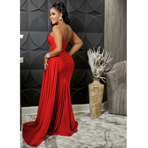 Detail view of the sleek red off-shoulder evening gown with elegant side draping fabric