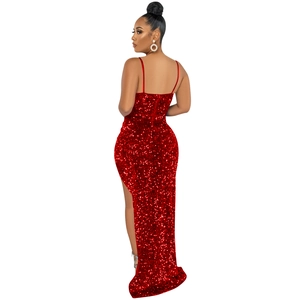 Detail of red sequined dress showing thin straps, open back and side slit design