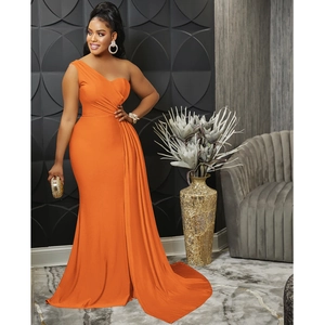 Detail view of the elegant orange one-shoulder floor-length gown with ruched waist side drape