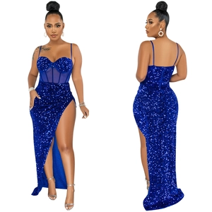 Detailed close-up of royal blue sequin mesh gown featuring high slit and corset bodice