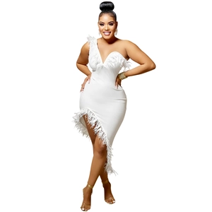 Detail of white V-neck sleeveless dress with elegant feather trim on the neckline and hem