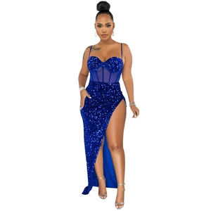 Detail shot of navy blue sequin slit dress showing corset mesh and high leg opening