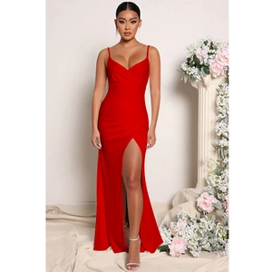 Elegant red satin evening dress featuring a deep V-neck, thin straps and a high side slit