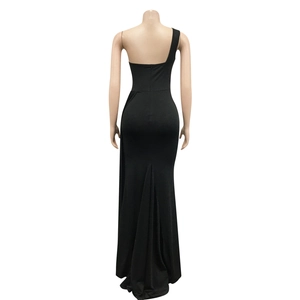 Detail of elegant backless one-shoulder fishtail evening dress in classic black