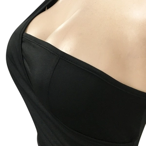 Close-up of tight black single shoulder dress fabric with premium edge stitching