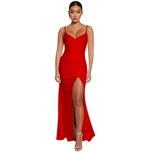 Detail view of deep red slim-fit evening gown featuring a high slit and V-neckline