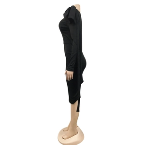 Detail of elegant black one-shoulder dress with bow ribbon and slim bodycon fit