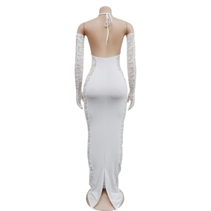 Back view of white halter dress with lace side panels and matching long lace gloves