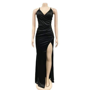 Detail of elegant black satin evening dress showing the V-neck and ruched waist design