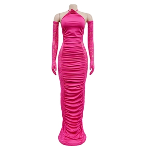 Detail of rose red ruched halter dress featuring 3D rose and lace gloves