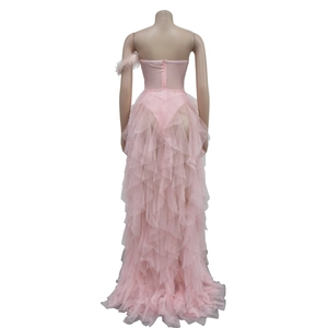 Detail of pink strapless evening gown with back zipper and layered mesh train