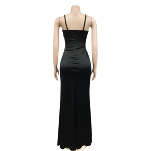 Back view of a sleek black satin evening gown with thin adjustable straps and a slim fit