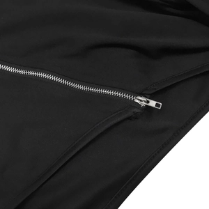 Detailed macro view of the silver metal zipper and black fabric texture on the dress
