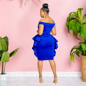 Detail of royal blue off-shoulder dress featuring tiered ruffle accents and slim fit cut