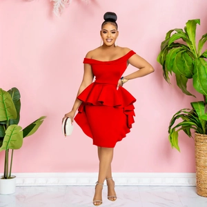 Detail of red off-shoulder cocktail dress featuring elegant peplum ruffles at the waist