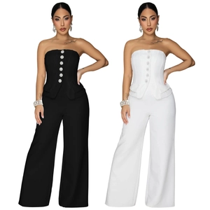 Chic strapless wide-leg jumpsuit for women featuring a peplum waist and button front detail