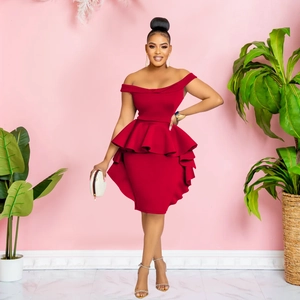 Detail view of the layered peplum hem on this wine red off-shoulder cocktail dress
