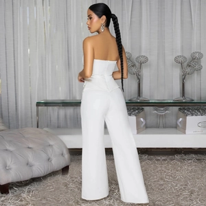 Rear view of elegant white strapless jumpsuit with high waist wide leg and backless detail
