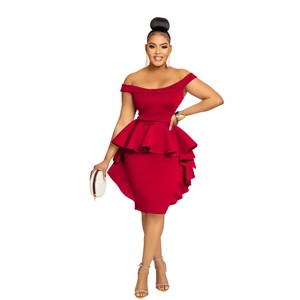 Detail of red off-the-shoulder peplum dress showing double-layered waist ruffle design