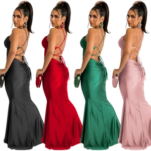 Detail view of backless satin dresses in black, red, green and pink color options