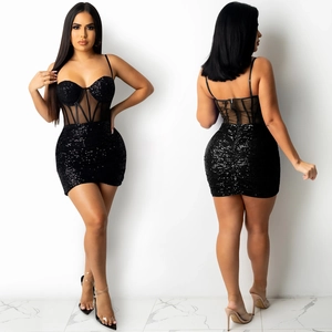 Detail view of black sequin mini dress with sheer mesh corset and back zipper