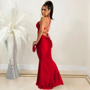 Detailed back view of a red backless evening dress with elegant lace-up strap design