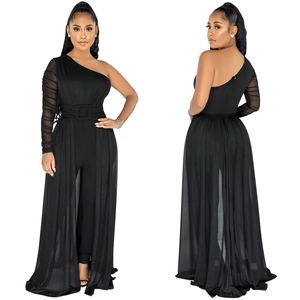 Detail of black one-shoulder mesh jumpsuit with sheer overlay and matching waist belt