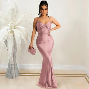 Detail of cross-wrap bodice and ruched waist on a dusty pink satin mermaid evening gown