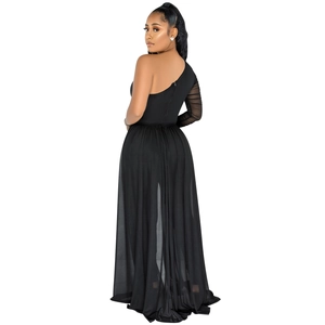Detail of sheer mesh sleeve and asymmetric shoulder on black evening jumpsuit gown