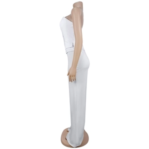 Detail of white tube top with side flap pocket and matching high waist wide leg pants