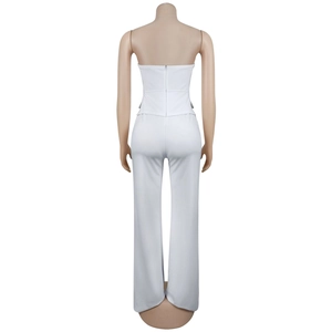 Back view of a white strapless wide-leg jumpsuit showing the hidden zipper and fabric texture