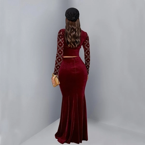Detailed back view of burgundy velvet evening set featuring shimmering rhinestone sleeves