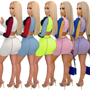 Women's sexy ribbed knit two-piece set featuring long sleeve crop top and mini skirt in 5 colors