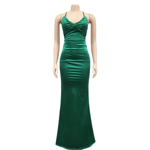 Detail of dark green satin dress showing V-neckline pleats and glossy fabric texture