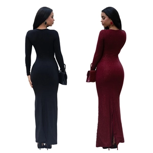 Detail of glitter stretch fabric and back slit on elegant bodycon evening dresses