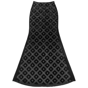 Close-up of black diamond pattern skirt with silver rhinestones and stud embellishments