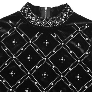 Detail of black velvet top with pearl and rhinestone diamond pattern and back neck zipper