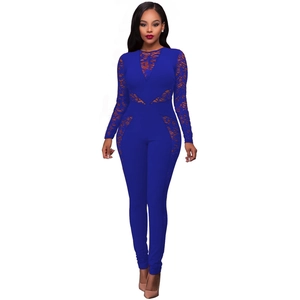 Detail of floral lace patchwork and see-through mesh on a navy blue slim fit jumpsuit