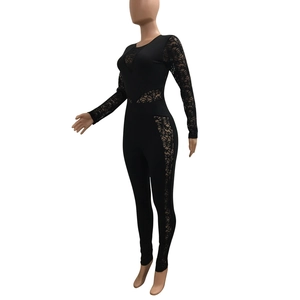 Detail of sheer black floral lace panels on the long sleeve bodysuit for a party look