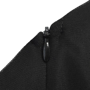 Detail of black mesh fabric texture featuring a seamless matching invisible zipper