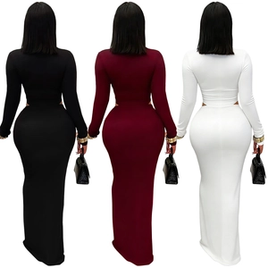 Detail view of two-piece bodycon set showing long sleeve crop top and high waist maxi skirt
